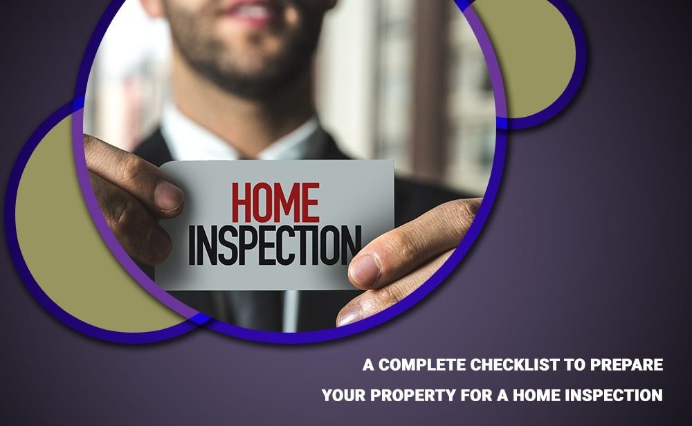A man holding up a business card with the words home inspection.